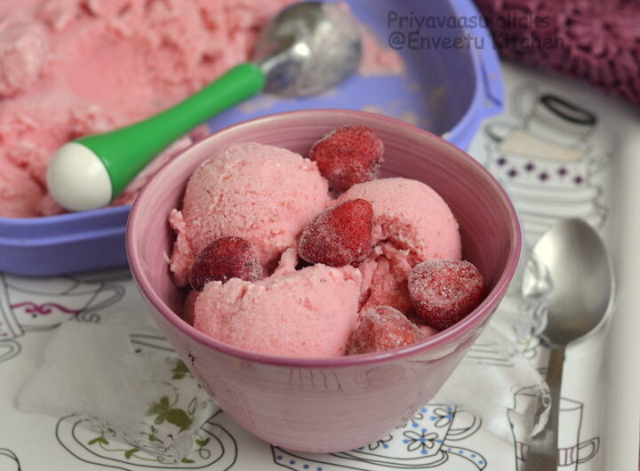 Strawberry frozen yogurt in a large bowl with berries on top