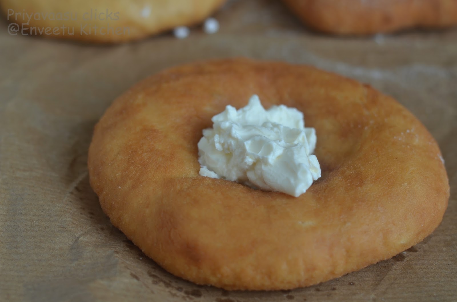 Hungarian Langos topped with cream cheese