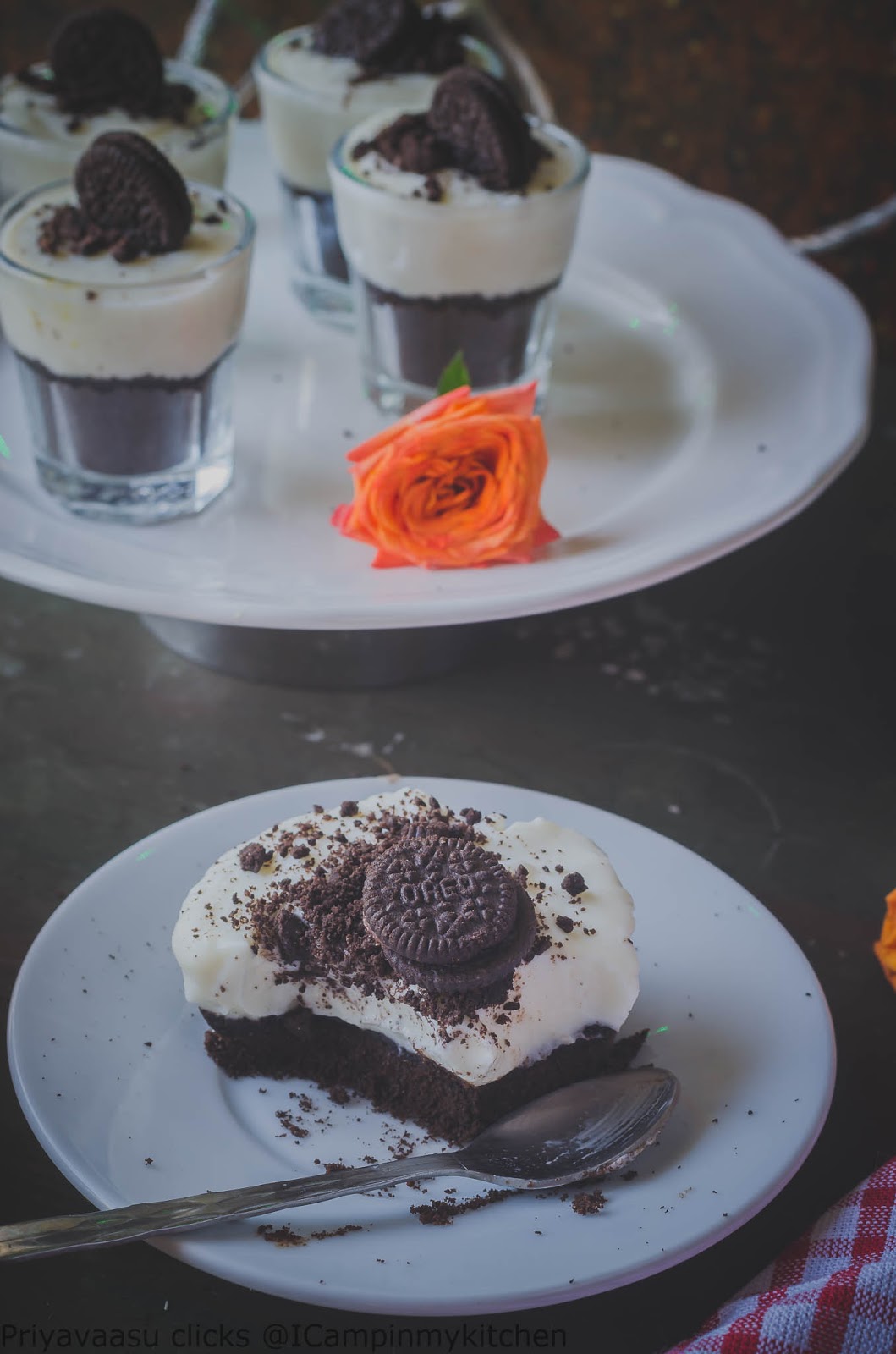 A sliced Oreo Cheesecake set in muffin pan