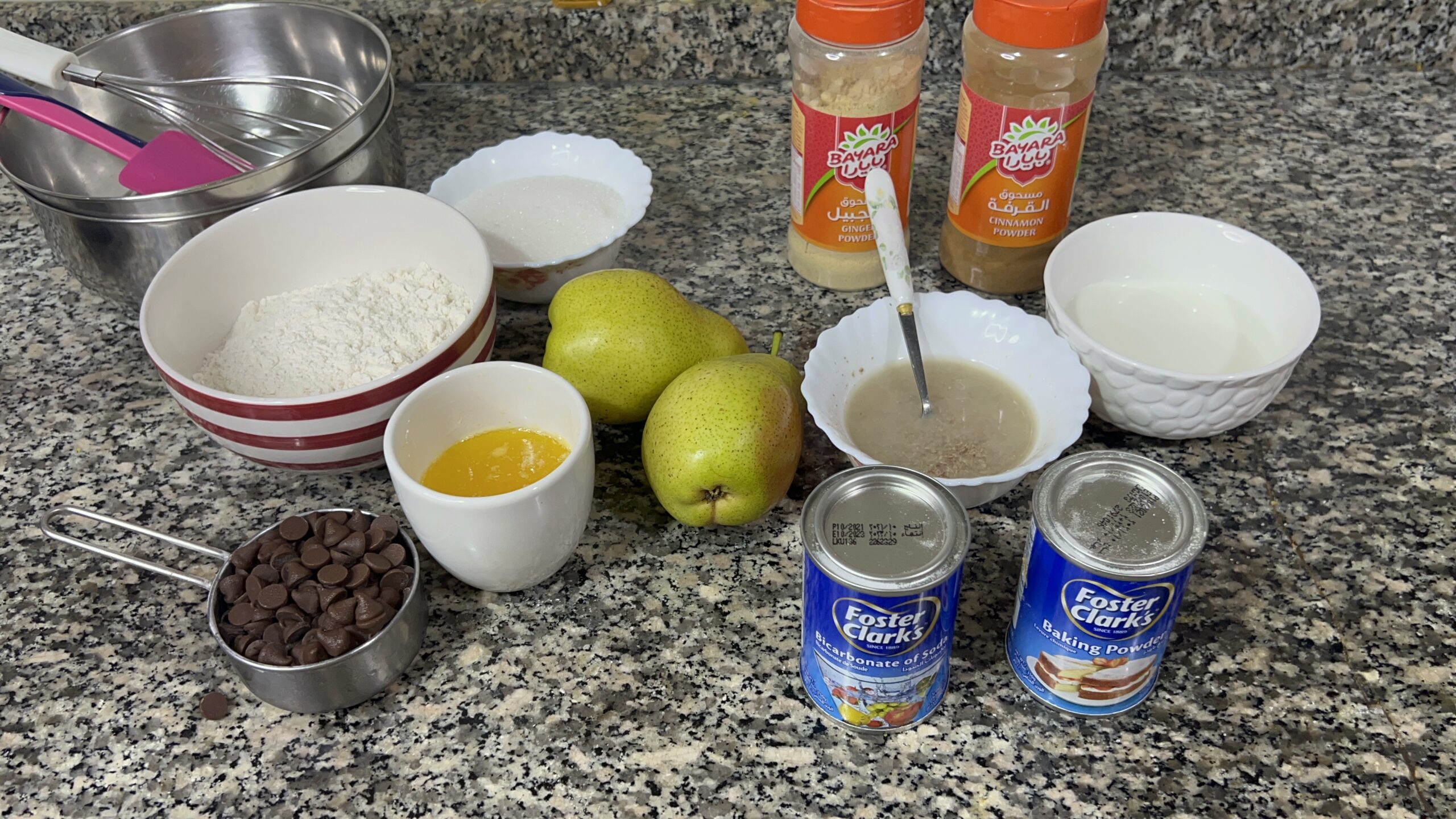 Ingredients for making  pear chocolate muffins