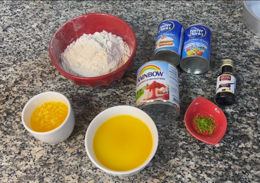 Ingredients for making condensed milk orange cake