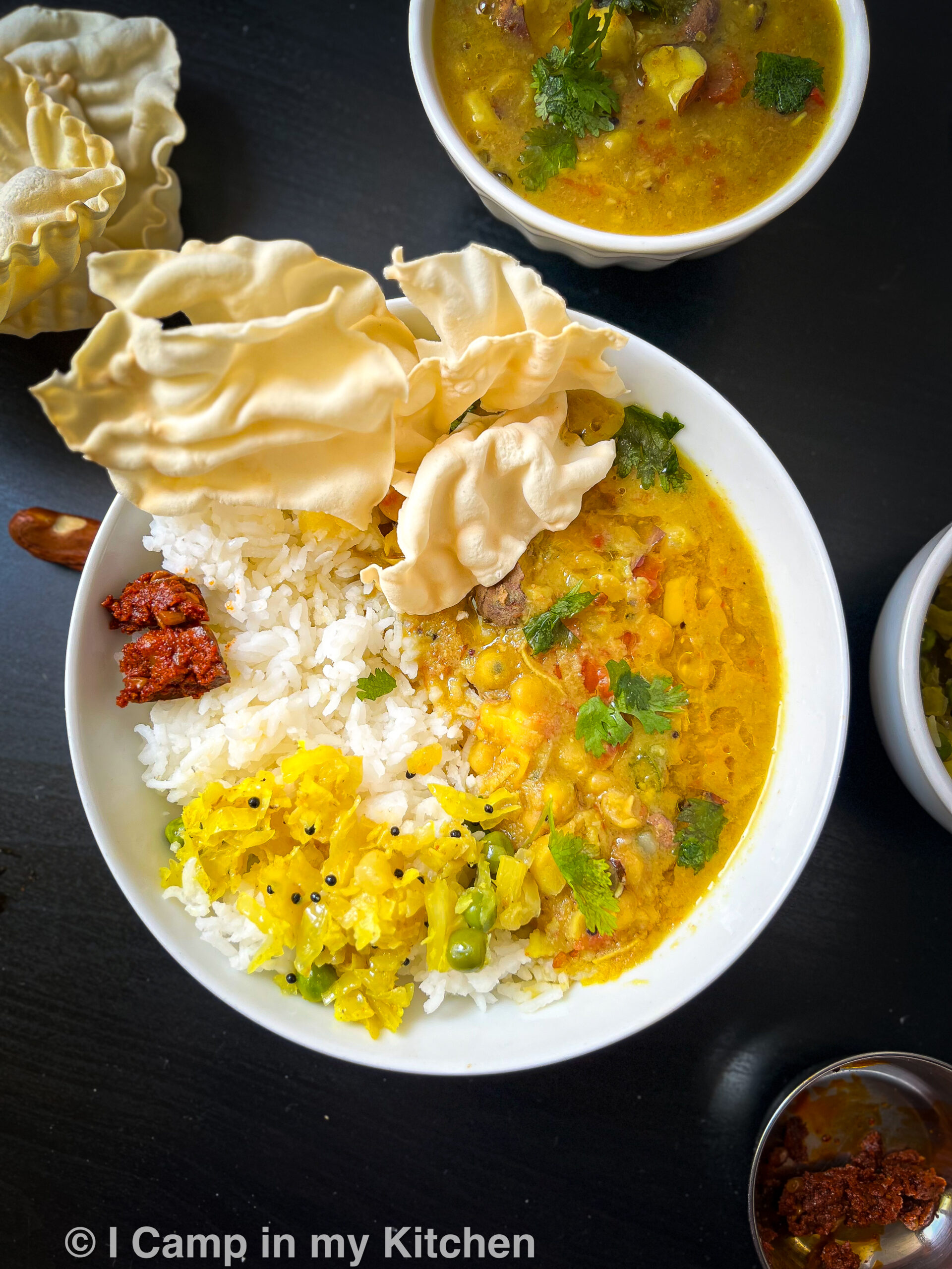 Lunch plate with jackfruit seeds dal