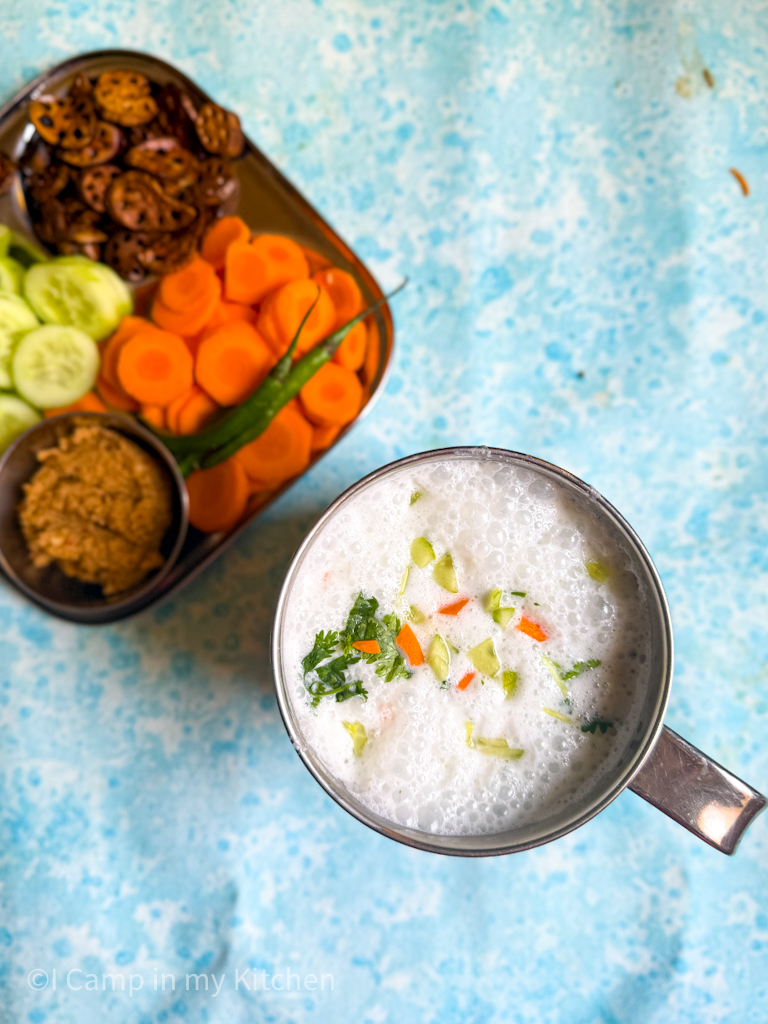Large serving of rice gruel with cucumber & carrots