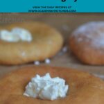 Hungarian popular street food, fried bread topped with cream cheese